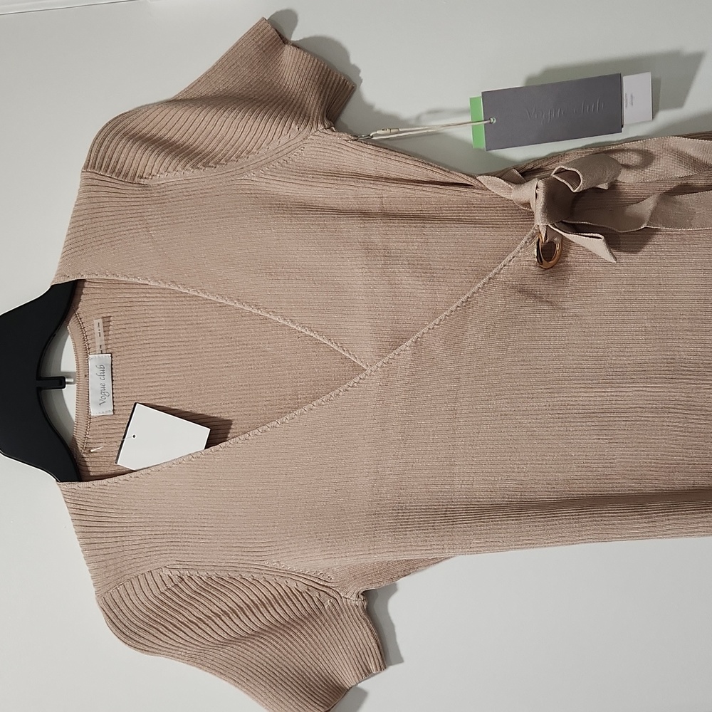 Tan tie wrap sweater w/short sleeves that wraps in front with tie on left side.